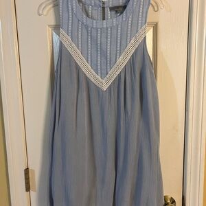 Elegant Blue Sleeveless Dress with Lace Accent